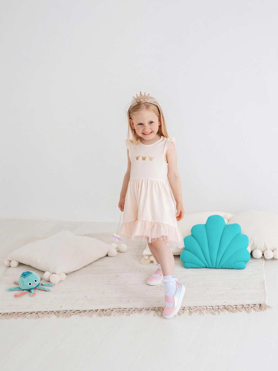 The Baby Dress Gold Fish 313 is a soft and comfy dress for fashionable little ladies. Made from high quality stockinet and blended with cotton and elastane, this dress has an easy clippable button closure on the shoulder for added ease in dressing. 