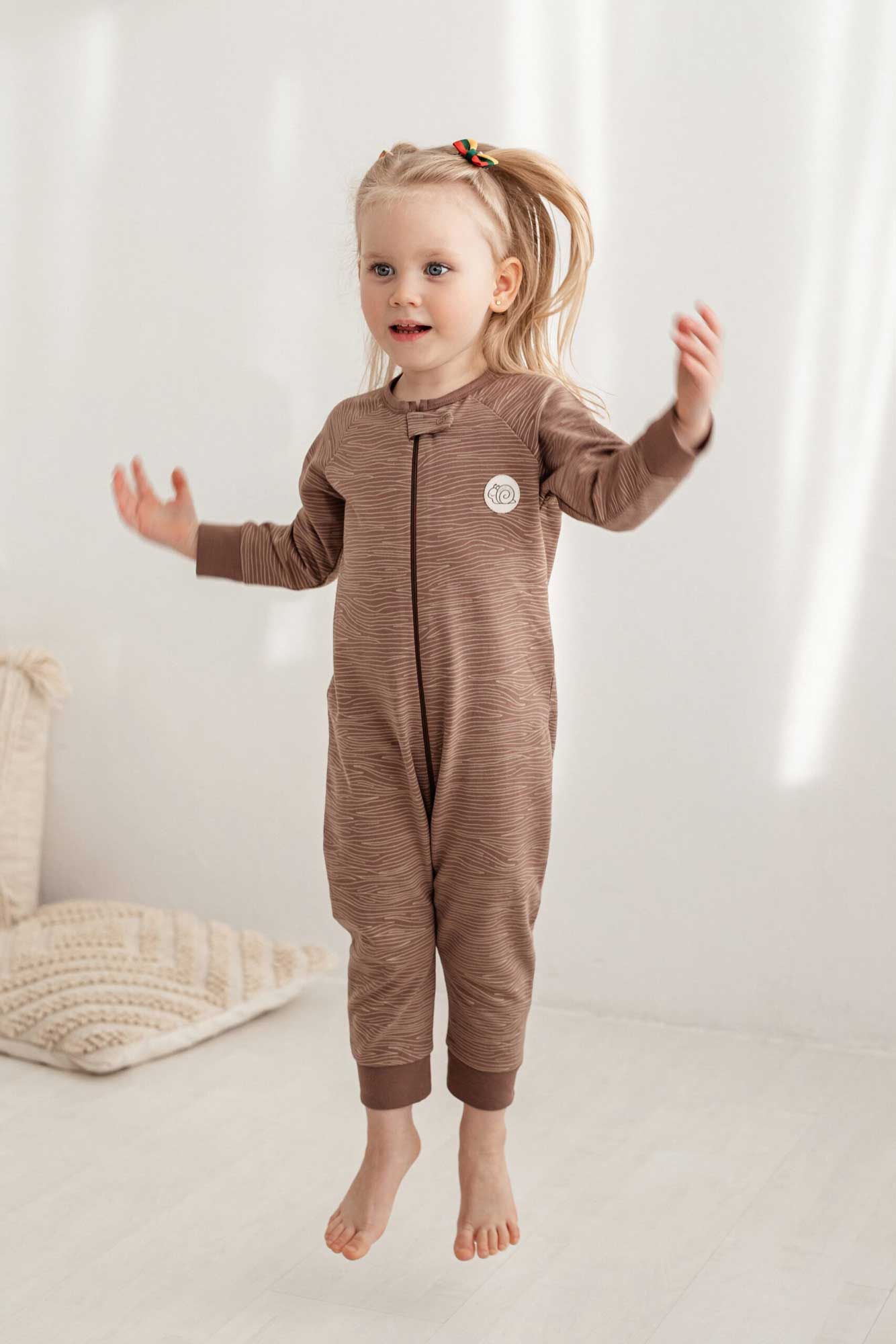 Infant overall snails 285 is made from especially soft cotton material. These one-piece overalls are warmer therefore are more suitable for outerwea