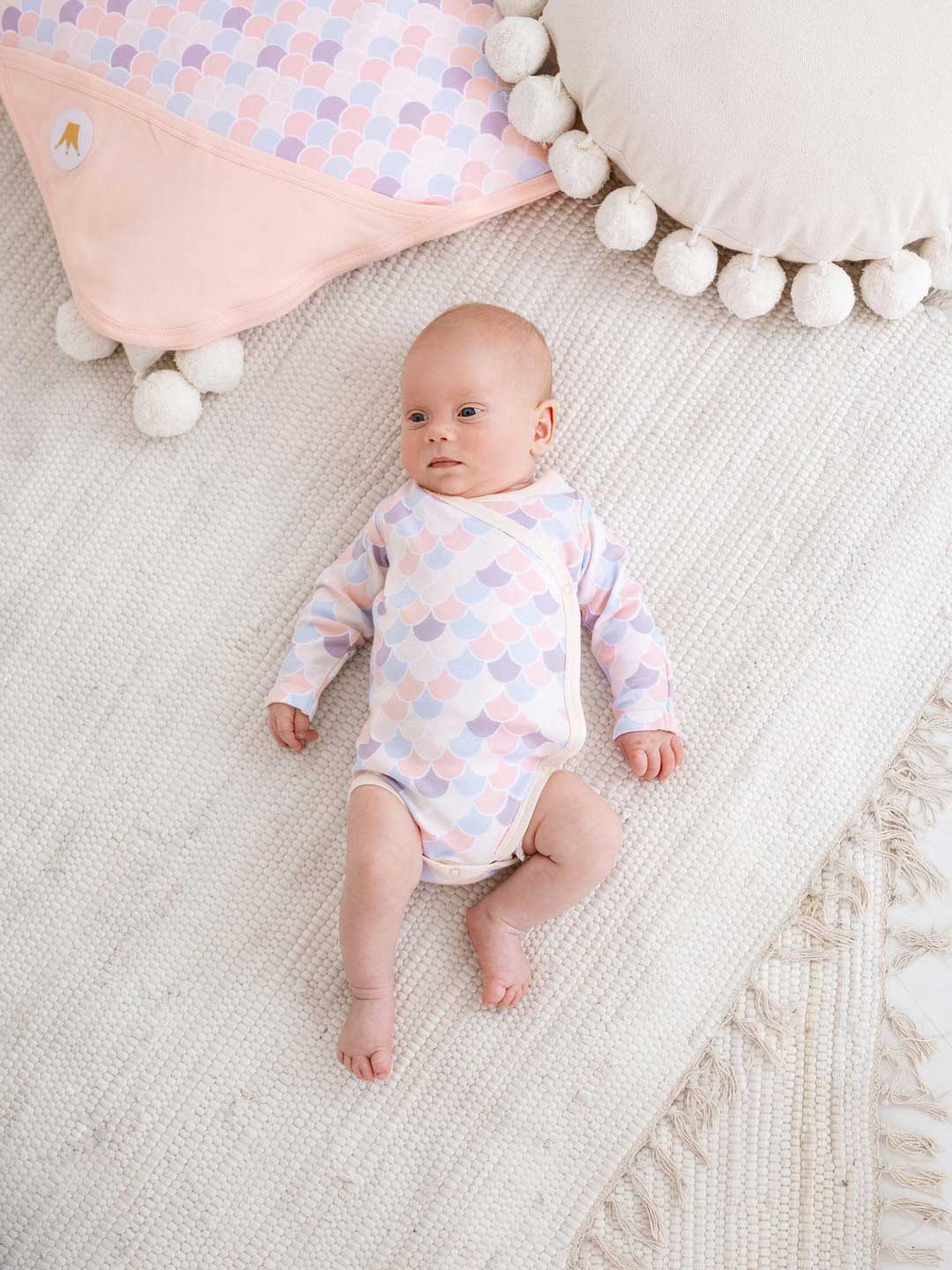 Crafted from 100% cotton, Infant Bodysuit Gold Fish 301 has been responsibly sourced according to Oeko-Tex Standard 100 and is an absolute must-have addition to your little one’s wardrobe.